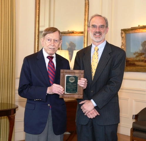 Roger E. Kirk and Vice Provost James Bennighof as Kirk is presented with the Cornelia Marschall Smith Professor of the Year