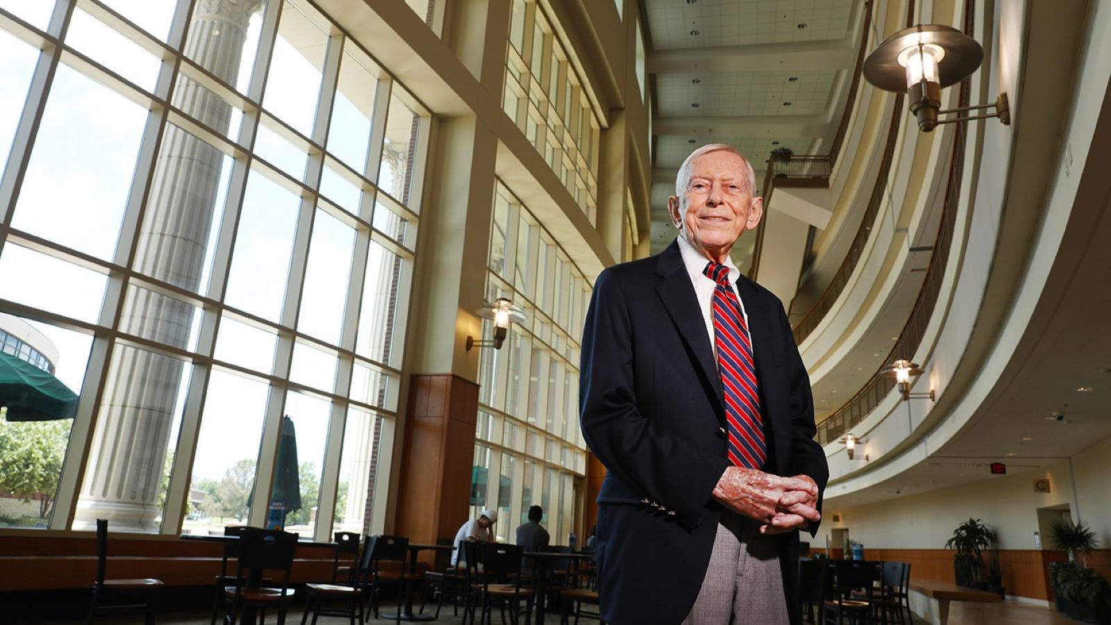 Dr. Roger E. Kirk in the atrium of the Baylor Sciences Building