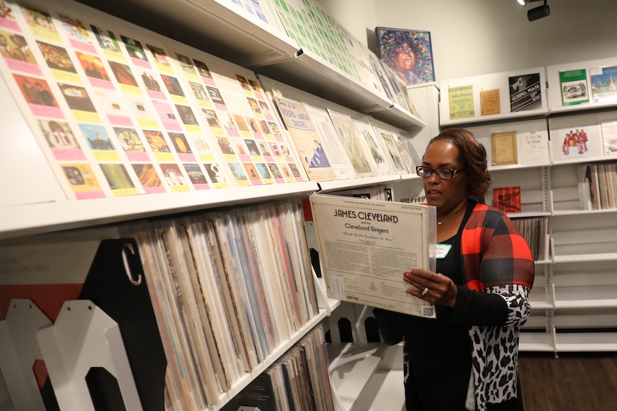 Women browsing albums in Baylor's Black Gospel Archive 