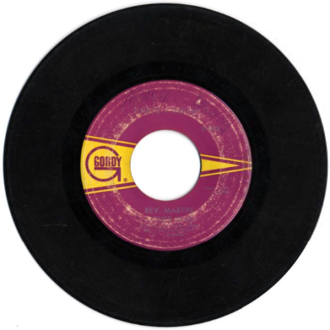 A 45 RPM record with a purple label