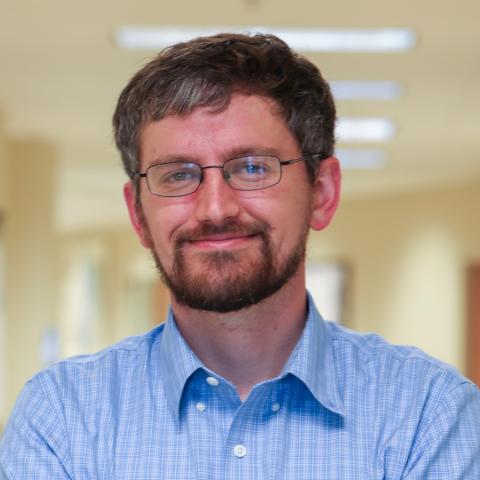 Peter James, Ph.D., planetary geophysicist, headshot