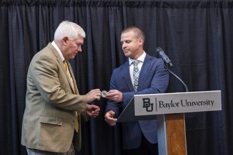 presentation of challenge coin at ARKTOS opening ceremony