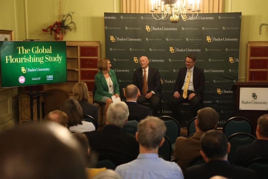 Baylor Provost Nancy Brickhouse and Professors Byron Johnson and Tyler VanderWeele talk during a panel discussion about the Global Flourishing Study.