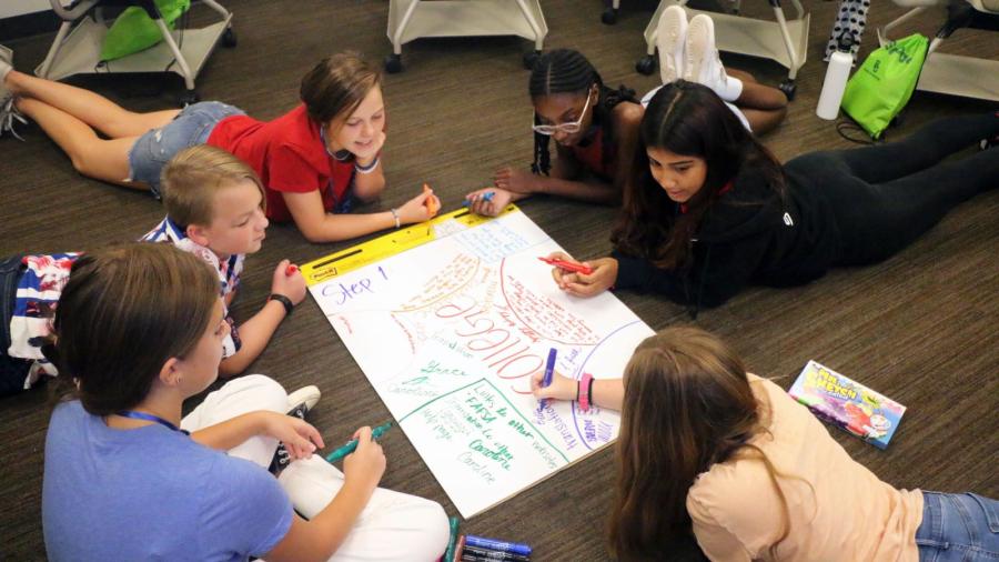 Students at iEngage Summer Civics Institute work together to resolve civic issues.
