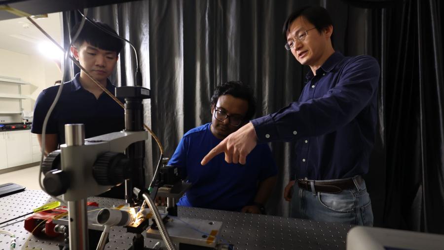Alan Wang, Ph.D., The Mearse Chair in Biological and Biomedical Engineering Professor at Baylor, works with students in the Nano-Optics and Advanced Health Sensing lab.