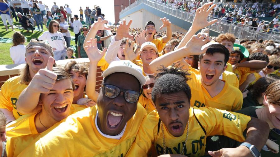 Baylor students in their gold Line jerseys show their school spirit before a football game