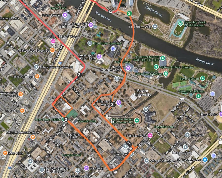 An aerial view of the Baylor campus with lines showing a half-marathon race route through campus..