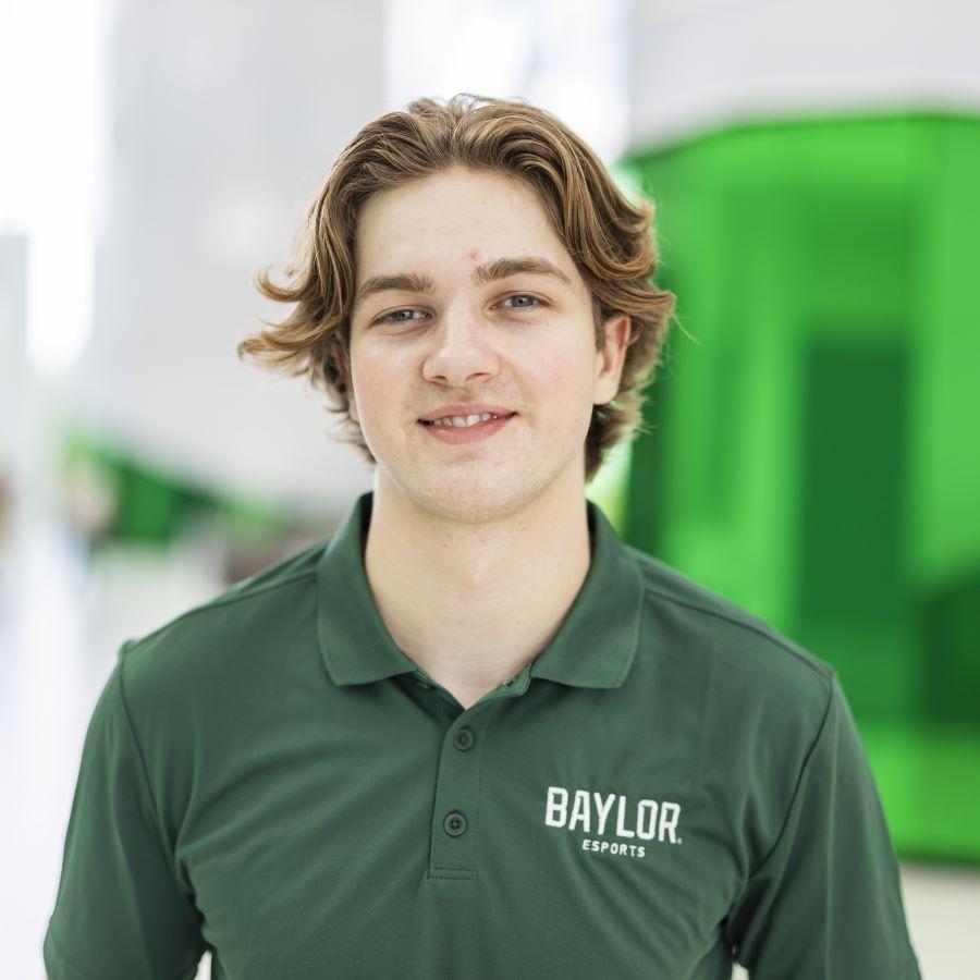 Colby James in a green Baylor Esports shirt