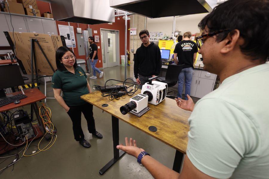 Baylor mechanical engineering professor Lulin Jiang works with student researchers in her Cornerstone Atomization and Combustion