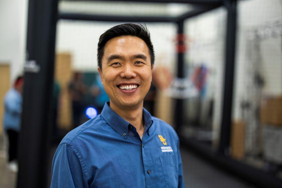 Smiling man in a blue shirt