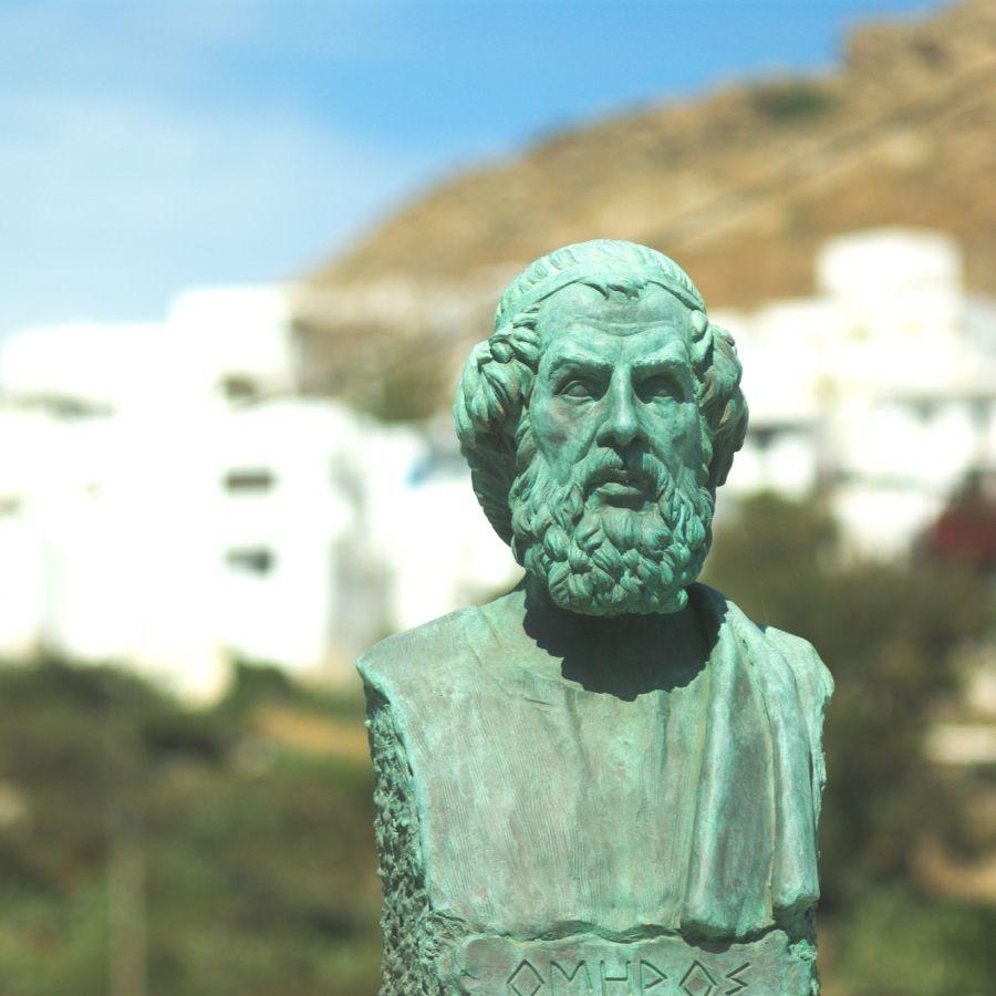 A selective focus shot of the bust of Homer in the Greek island of Ios