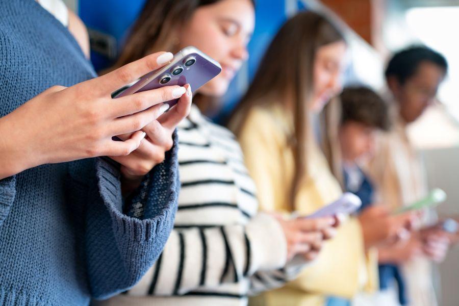 Children looking at phones