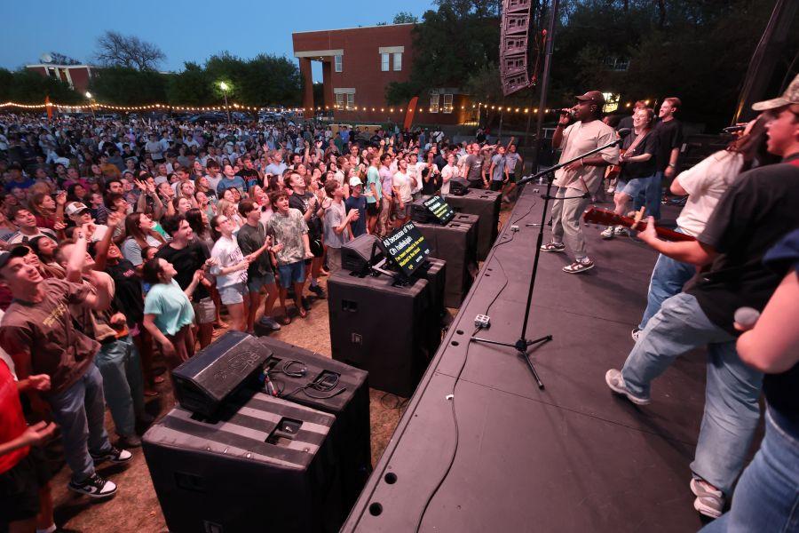 Thousands of students attend a worship gathering on the campus of Baylor University.